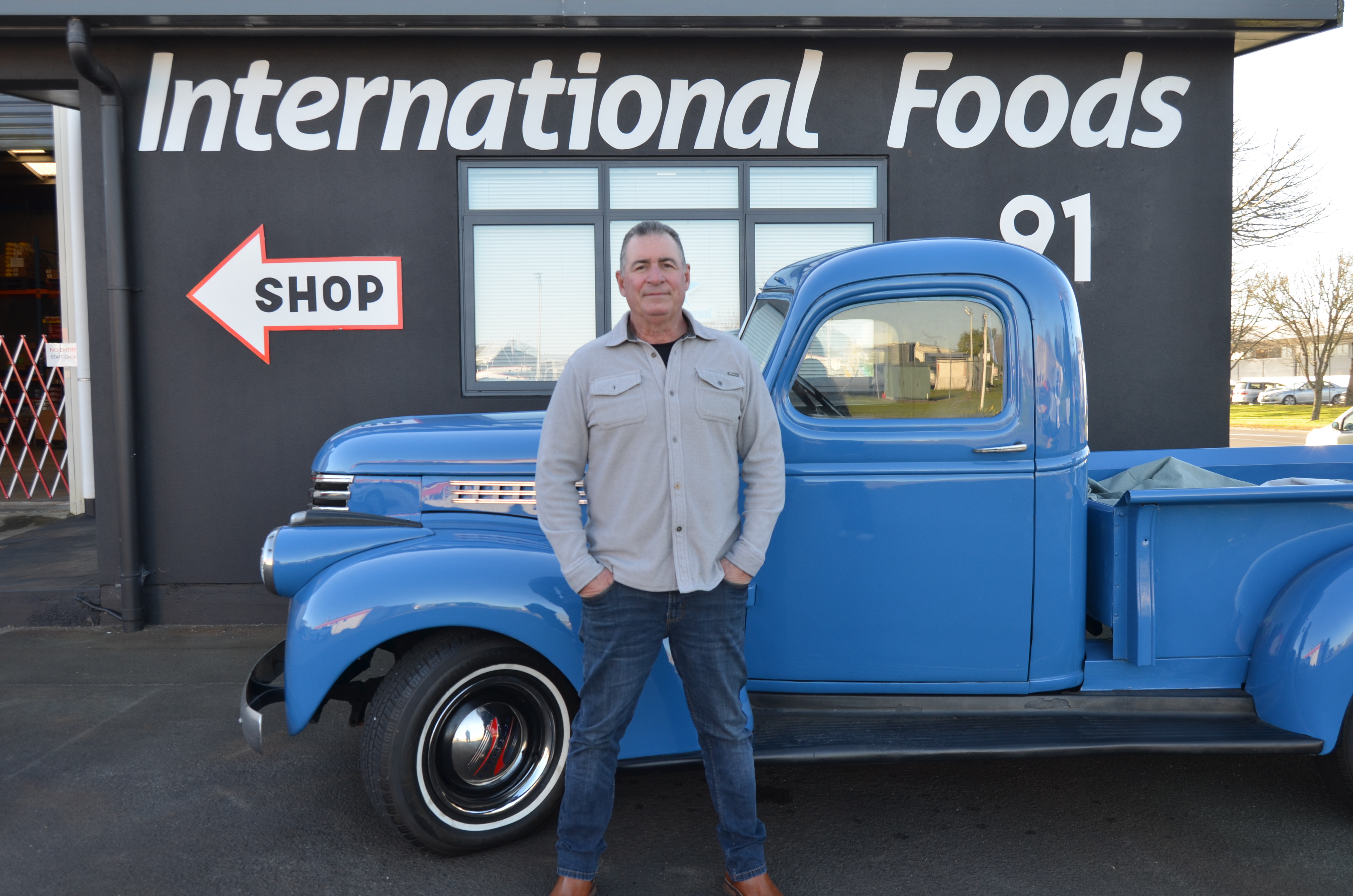 Steve Sartin beside the International Foods truck